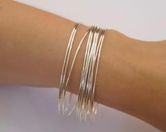Juego de 10 brazaletes finos hechos a mano de plata de ley 925.