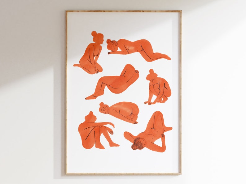 May include: Orange watercolor print featuring seven figures in various poses. The figures are depicted in a minimalist style, with simple lines and shapes. The artwork is framed in a light-colored wooden frame, suitable for wall decor.