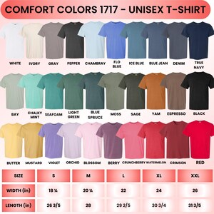 May include: A color chart for Comfort Colors 1717 unisex t-shirts displaying twenty-seven solid color options including white, ivory, gray, pepper, chambray, blue, green, yellow, pink, and red shades, with a size chart showing width and length in inches.