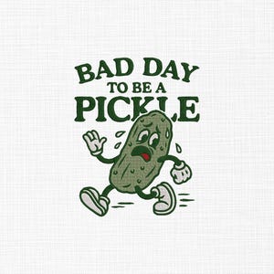 May include: A distressed cartoon pickle with a worried expression runs across a white background. The text above reads "BAD DAY TO BE A PICKLE" in dark green. The pickle is green with white shoes and gloves.