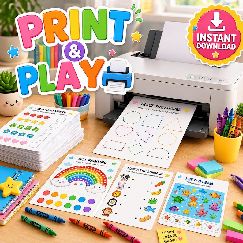 May include: A white printer sits on a desk with educational activity sheets featuring shapes, counting, and matching games. Colorful crayons, a stack of worksheets, and a yellow cup are arranged nearby. The text reads Print & Play and Instant Download.
