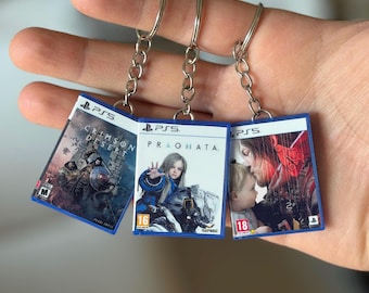Sleutelhanger PS5-gamecase – Pragmata, Cyberpunk, Tomb Raider – aangepaste gepersonaliseerde mini PS5-sleutelhanger voor tas en sleutels – cadeau voor gamer