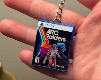 Arc Raiders PS5-minigamecase-sleutelhanger – handgemaakt gaming-verzamelaarsitem – gamercadeau voor hem/haar – displayaccessoire in PlayStation-stijl