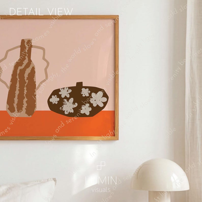May include: A framed art print featuring abstract shapes in brown, orange, and pink. The artwork includes a vase-like form with vertical stripes and a dark brown shape with white flower accents. The text "DETAIL VIEW" is visible at the top.
