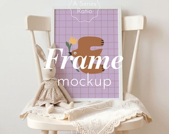 Nursery White A4 Frame Mockup Leaning on Chair