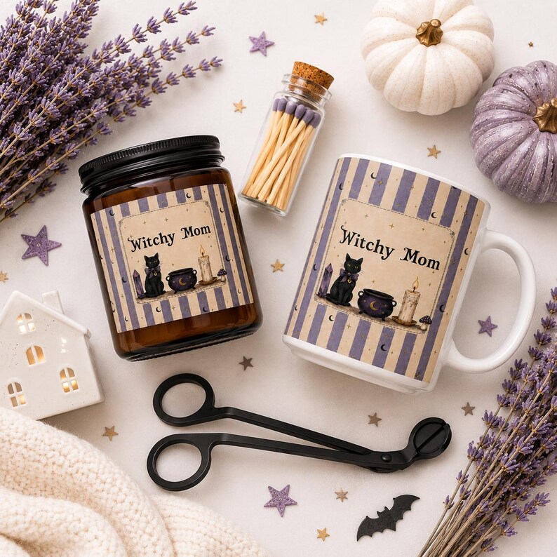 May include: A brown glass candle jar and a white ceramic mug, both featuring a label with the text Witchy Mom, a black cat, a cauldron, and a candle. Includes a small glass bottle of matches, black metal wick trimmers, lavender, and pumpkins.