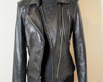 Vintage black leather jacket with ruffles