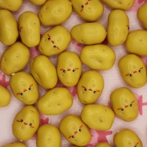 May include: A handmade, wooden serving tray with a natural finish. The tray features a rectangular shape with raised edges and integrated handles. The wood grain is visible, showcasing the tray's rustic charm. Dimensions are approximately 16 inches long, 10 inches wide, and 2 inches high.