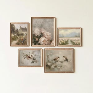 May include: A set of five framed vintage-style art prints. The prints feature floral, landscape, and bird themes in soft, muted colors. Each print is encased in a gold-toned frame, creating a cohesive gallery wall aesthetic.