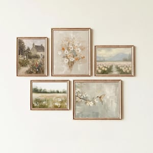 May include: Five framed landscape paintings with gold-colored frames are displayed on a white wall. The paintings depict scenes of a house, flowers, a field, a tulip field, and a hummingbird. The artwork has a vintage, rustic aesthetic.