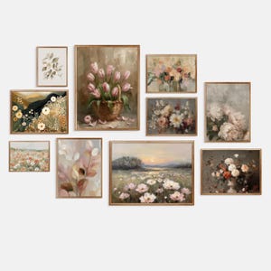 May include: A collection of framed floral art prints in various sizes. The artwork features soft, muted colors and depicts flowers, landscapes, and botanical studies. The frames are a warm, natural wood tone, creating a cohesive gallery wall aesthetic.
