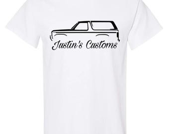 Camiseta blanca de Justin's Customs
