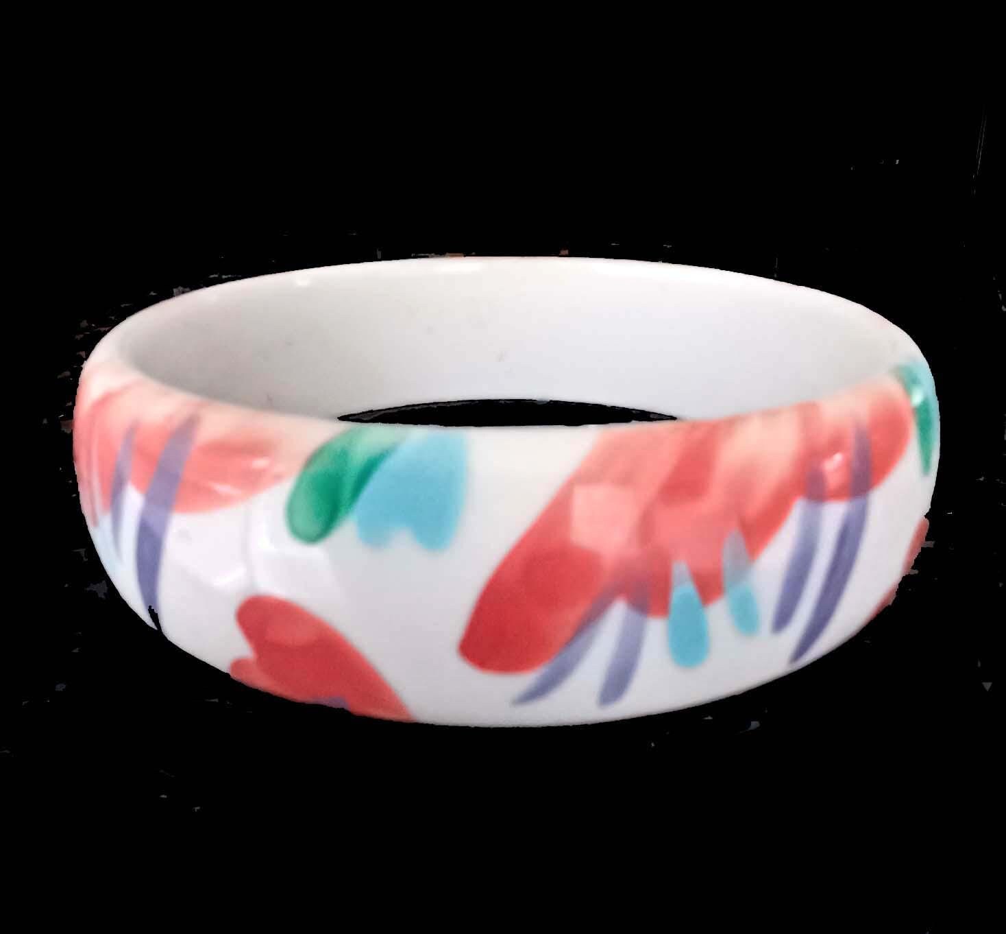 ヴィンテージ ルーサイト バングル 陽気な芸術的なデザインの