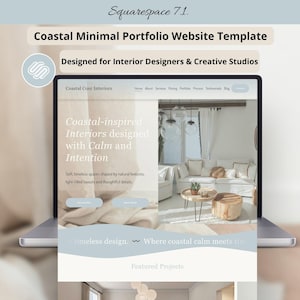 May include: A laptop screen showing a website template. The template is titled "Coastal Minimal Portfolio Website Template" and is designed for interior designers and creative studios. The website has a coastal-inspired design, emphasising calm and intention.