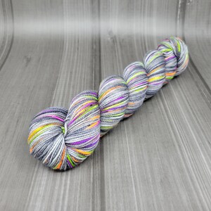 Superwash merino wool & nylon   fingering weight  Spooky Halloween Grey black tonal reverse speckles green purple orange