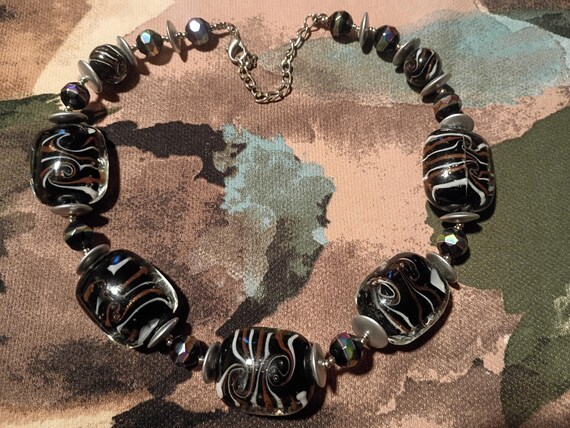 Vintage handcrafted lamp work glass beaded necklace.
