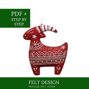 May include: A red felt goat ornament featuring white embroidered geometric patterns, a striped horn, and a hanging loop. The text "PDF + STEP BY STEP" and "FELT DESIGN WONDER FELT STORY" is visible on the green background surrounding the goat.