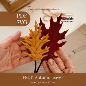 May include: Two felt autumn leaves in mustard yellow and deep burgundy with dark brown stems. The image includes text: Tiny stitches, big heart, PDF, SVG, YouTube VIDEO TUTORIAL, FELT Autumn leaves, WONDER FELT STORY, and white-couturier.com.