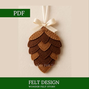 May include: A felt pinecone decoration in various shades of brown, with a cream ribbon and bow. The text "PDF" is in the upper left corner, and "Wonder Felt Story" is written on the bottom. The words "FELT DESIGN" are in a green rectangle.