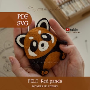 May include: A small, handcrafted felt red panda plush toy featuring brown, black, and white felt pieces with stitched details. The text on the image includes "Tiny stitches, big heart", "PDF SVG", "YouTube VIDEO TUTORIAL", "white-couturier.com", "FELT Red panda", and "WONDER FELT STORY".