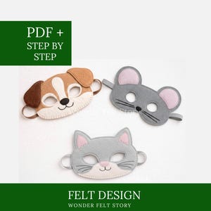 以下が含まれることがあります： 犬、ネズミ、猫の3つのフェルト動物マスク。犬のマスクは茶色と白、ネズミはピンクの耳のグレー、猫はピンクの耳とピンクの鼻のグレーです。マスクにはゴムバンドが付いています。画像には「PDF + STEP BY STEP」と「FELT DESIGN WONDER FELT STORY」と書かれています。