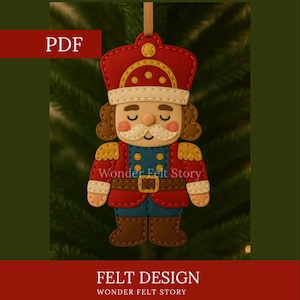 May include: A felt Christmas ornament in the shape of a nutcracker soldier. The ornament has a red hat and jacket, blue pants, and brown boots. The text "PDF" is in the upper left corner, and "FELT DESIGN" and "Wonder Felt Story" are at the bottom.