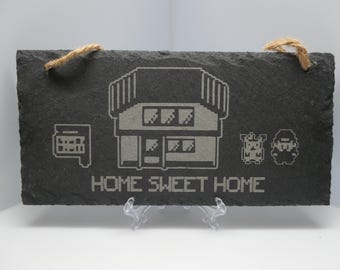 Pizarra colgante de Pokémon "Hogar, dulce hogar" grabada con láser (Tamaño pequeño - 200 x 100 mm)