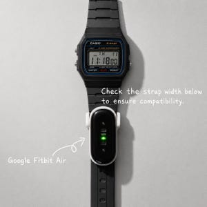 May include: A black Casio F-2AM digital watch with a rectangular face and a black strap. A white and black Google Fitbit Air tracker is attached to the watch strap. Text reads: Check the strap width below to ensure compatibility. Google Fitbit Air.