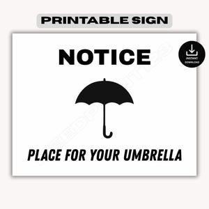 May include: A printable sign with the words "NOTICE PLACE FOR YOUR UMBRELLA" in black text. A black umbrella icon is centered below the word "NOTICE". The words "PRINTABLE SIGN" are at the top of the sign.