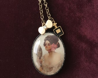Large vintage-inspired necklace with pendant and charms