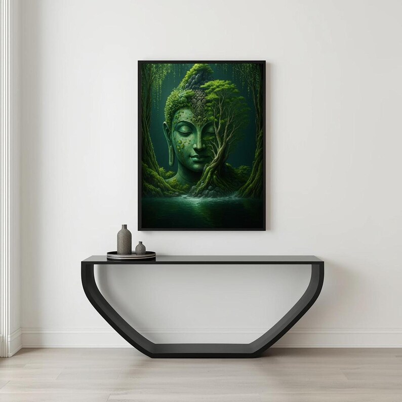 A large framed print of a green Buddha head in a forest hangs above a black console table with two dark vases.