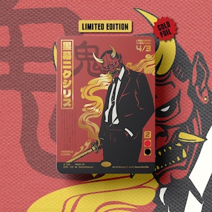 May include: A rectangular trading card featuring a red background with a central illustration of a figure in a black suit wearing a red oni mask and holding a sword. The card includes gold foil accents, Japanese text, the words LIMITED EDITION, and 4/3.