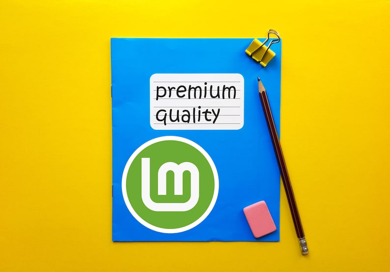 May include: A blue notepad with a green and white logo and the words "premium quality" on a white sticker. A pencil, pink eraser, and yellow binder clip are also on the yellow background.