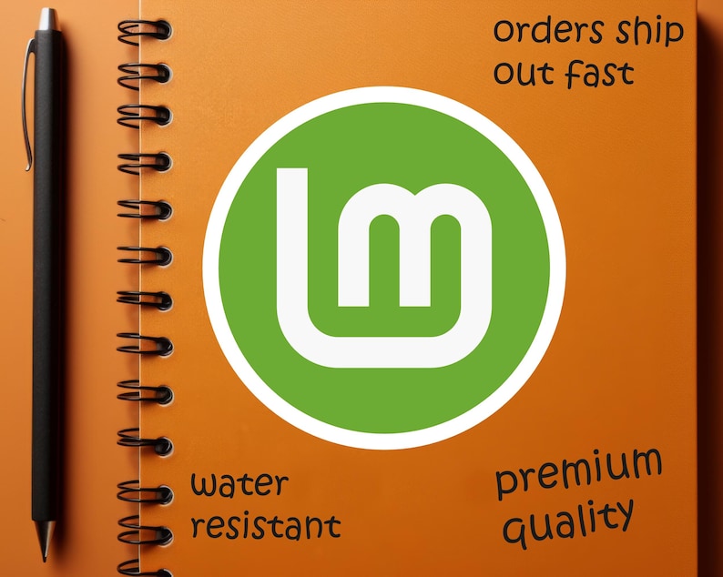 May include: An orange spiral-bound notebook with a black pen resting on the left side. A green circle with a white "lm" logo is centered on the page. Text includes "orders ship out fast", "water resistant", and "premium quality".