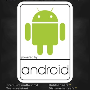 May include: A rectangular sticker featuring a lime green Android robot icon above the text 'powered by: android'. The sticker has a white border and black background. Text includes 'stick me! somewhere cool...', 'Premium matte vinyl', 'Tear-resistant', 'Water-resistant ink', 'Outdoor safe', 'Dishwasher safe', and 'Multiple sizes available'.