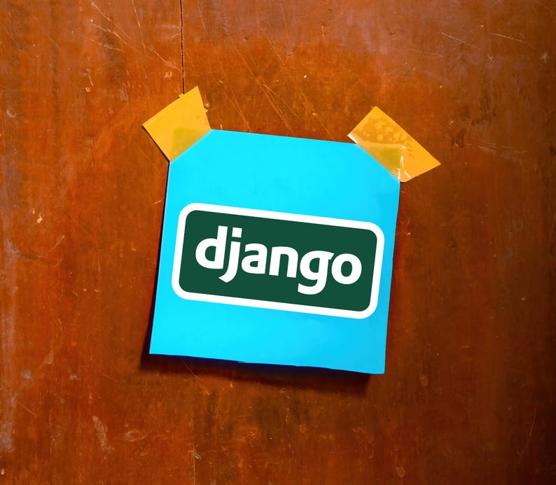 May include: A bright blue sticky note with the word "django" in white letters inside a green rectangle. The note is attached to a wooden surface with two pieces of yellow tape.