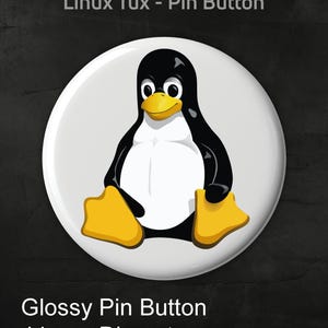 May include: Glossy pin button featuring the Linux Tux penguin mascot. The button is white with a black and white penguin design, yellow feet and beak. The button is 4.4 cm in diameter.