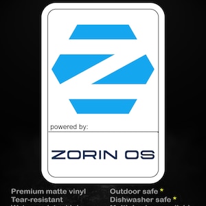 May include: White sticker with a blue geometric design and the text "ZORIN OS". The sticker also includes the text "stick me! somewhere cool..." and details about the sticker's features, including being outdoor and dishwasher safe.