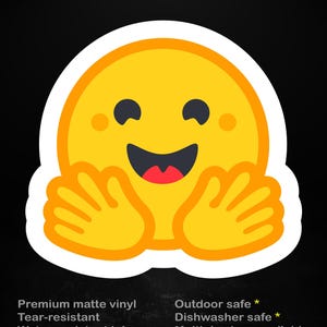 May include: A yellow emoji sticker featuring a smiling face with two hands reaching forward. The text reads stick me! somewhere cool... Premium matte vinyl, Tear-resistant, Water-resistant ink, Outdoor safe, Dishwasher safe, Multiple sizes available.