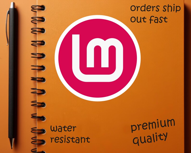 May include: An orange spiral-bound notebook with a black pen on the left side. A pink circle with white text is in the center. The notebook has the words "orders ship out fast", "water resistant", and "premium quality".