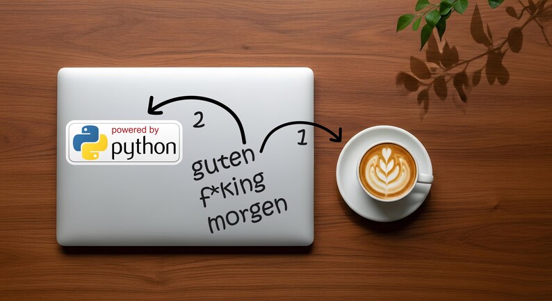 May include: A laptop with a "powered by python" sticker and the words "guten f*king morgen" written on it. A cup of coffee with latte art sits on a saucer to the right. The items are on a wooden surface.
