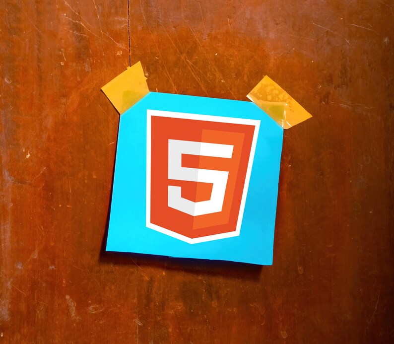 May include: A blue paper with the number 5 inside a red and white shield, taped to a wooden surface with two pieces of yellow tape. The number 5 is white and the shield is red with a white border.