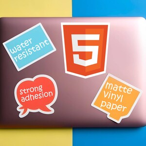 May include: A collection of stickers on a laptop. The stickers include text that reads "water resistant", "strong adhesion", and "matte vinyl paper". One sticker features the number "5" inside an orange shield.