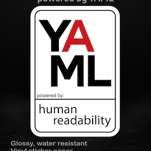 Puede incluir: Una pegatina blanca con borde negro y el texto "YA ML" en negro y rojo. Debajo, se lee "human readability". La pegatina está etiquetada como "powered by YAML" y está hecha de vinilo brillante resistente al agua.