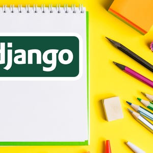 May include: A white spiral notebook with a green border and the word "django" in white letters on a green rectangle. Pencils, an eraser, and a pencil sharpener are scattered on a yellow surface.