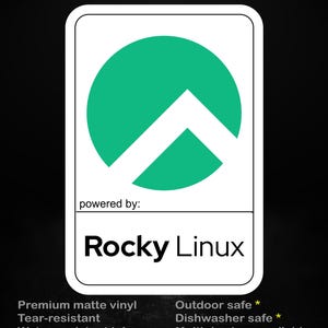 May include: A white sticker with a green circle and a white upward-pointing arrow design. The text "stick me! somewhere cool..." is at the top, and "Rocky Linux" is printed below the logo. Additional text includes "Premium matte vinyl" and "Outdoor safe *."