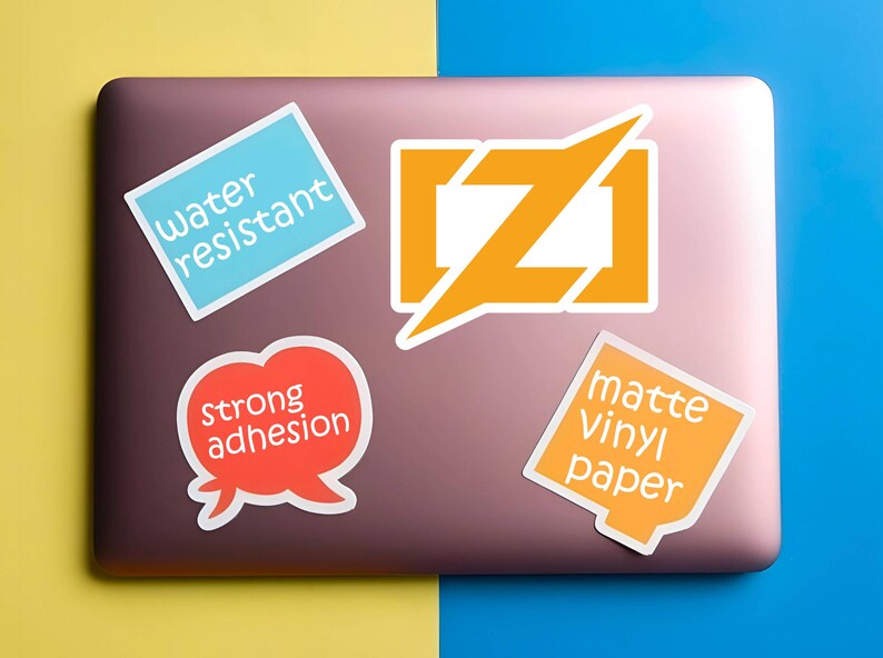 Puede incluir: Un conjunto de pegatinas sobre un ordenador port&aacute;til. Las pegatinas incluyen texto que dice "resistente al agua", "fuerte adhesi&oacute;n" y "papel vin&iacute;lico mate". Las pegatinas son de varias formas y colores, incluyendo azul, naranja y rojo.