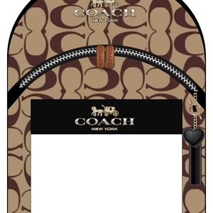 May include: A tan and brown monogram print backpack featuring the Coach New York logo and horse and carriage emblem. The bag includes a front zippered pocket with a black rectangular panel, silver hardware, and a black heart-shaped charm.