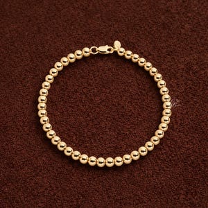 4 mm pärlarmband för kvinnor, stapelbart pärlkularmband, armband med guldkulor, minimalistiskt och elegant guldarmband, jubileumspresent