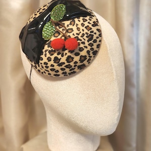 Rockabilly leopard cherry charm hat fascinator, cocktail hat, pinup,